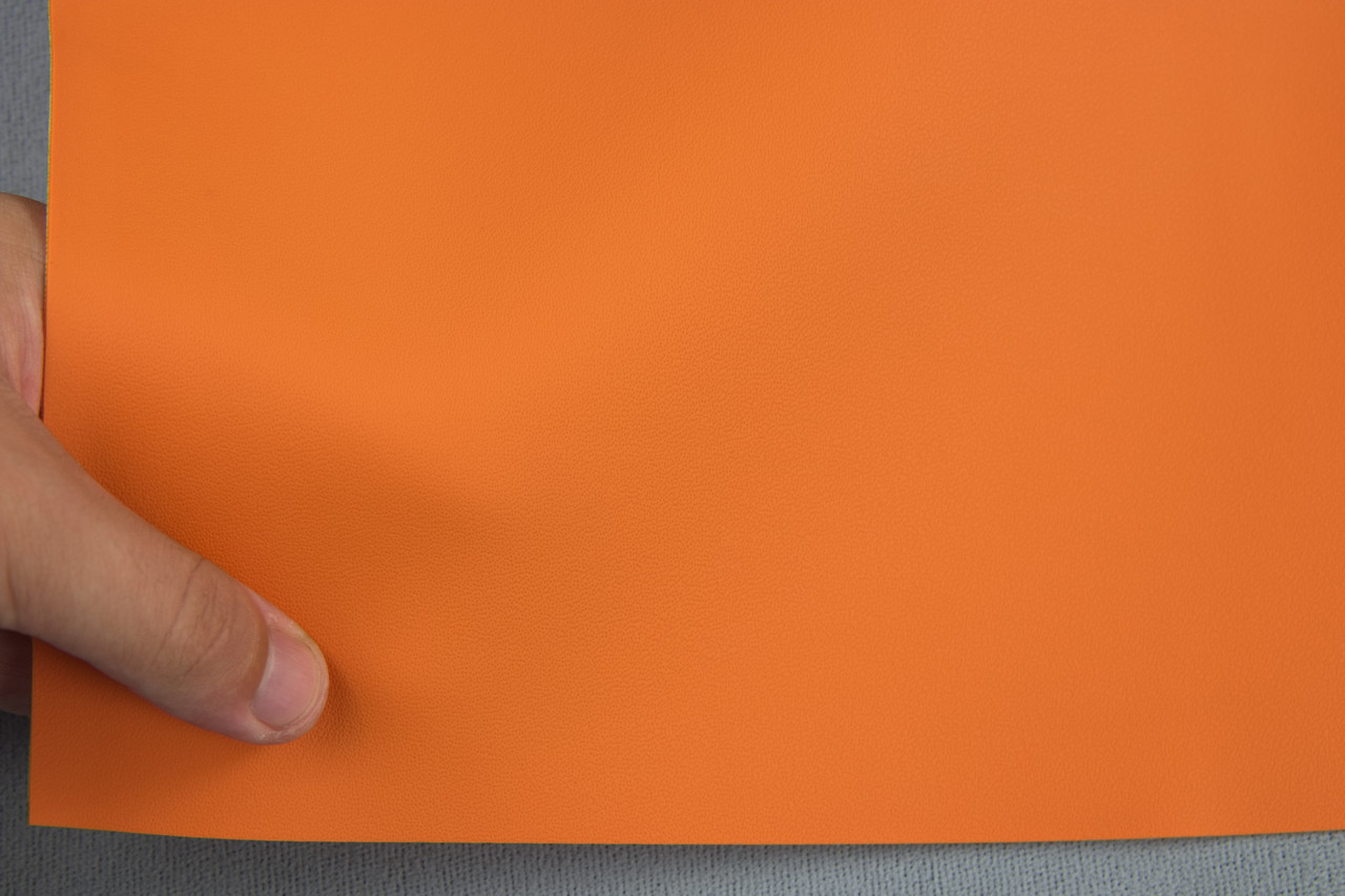 Автомобильный кожзам BENTLEY 1220 оранжевий, на тканевой основе, ширина 140см, Турция детальная фотка